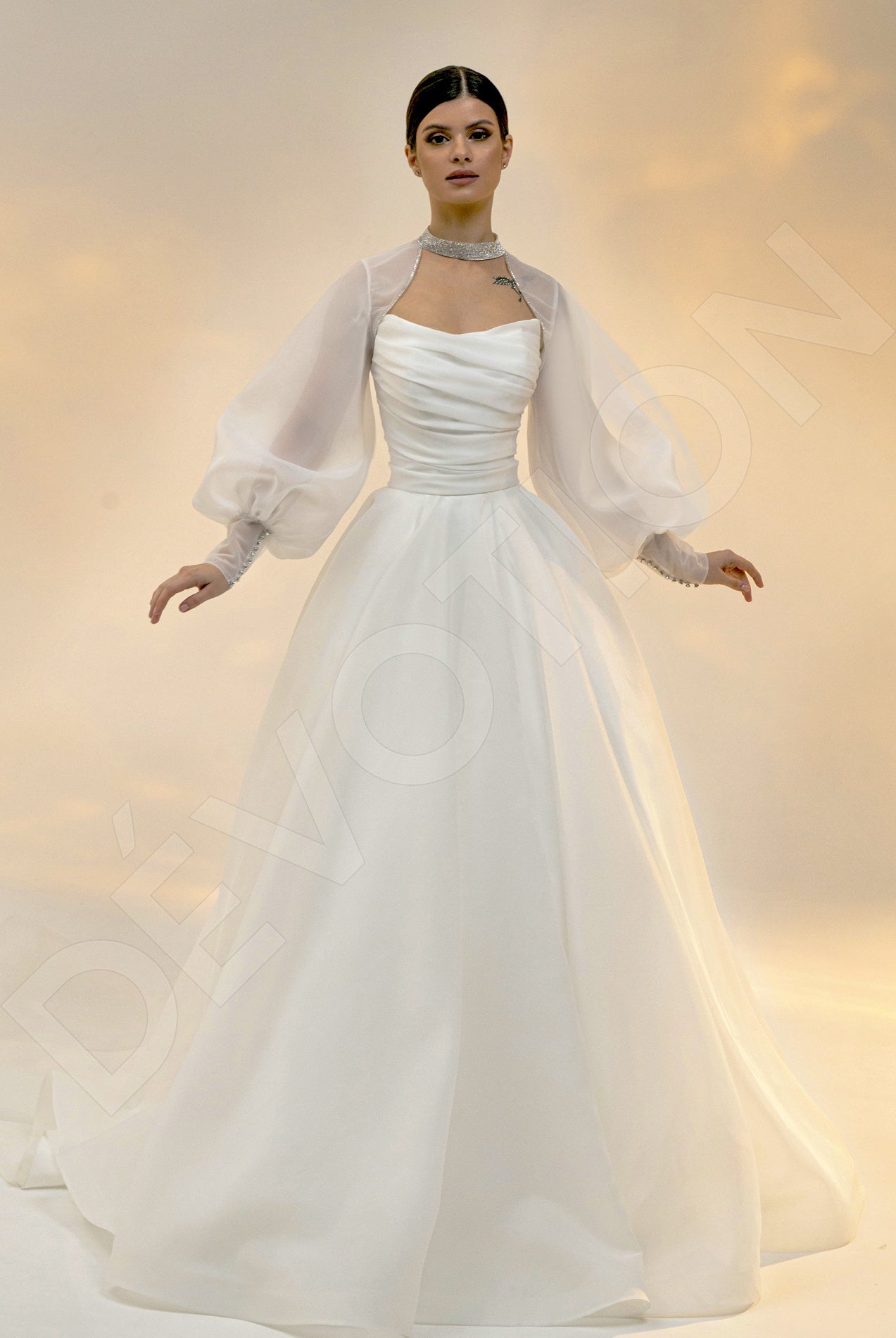 The Ariala Princess/Ball Gown in a radiant Light Ivory, perfect for a winter fairytale