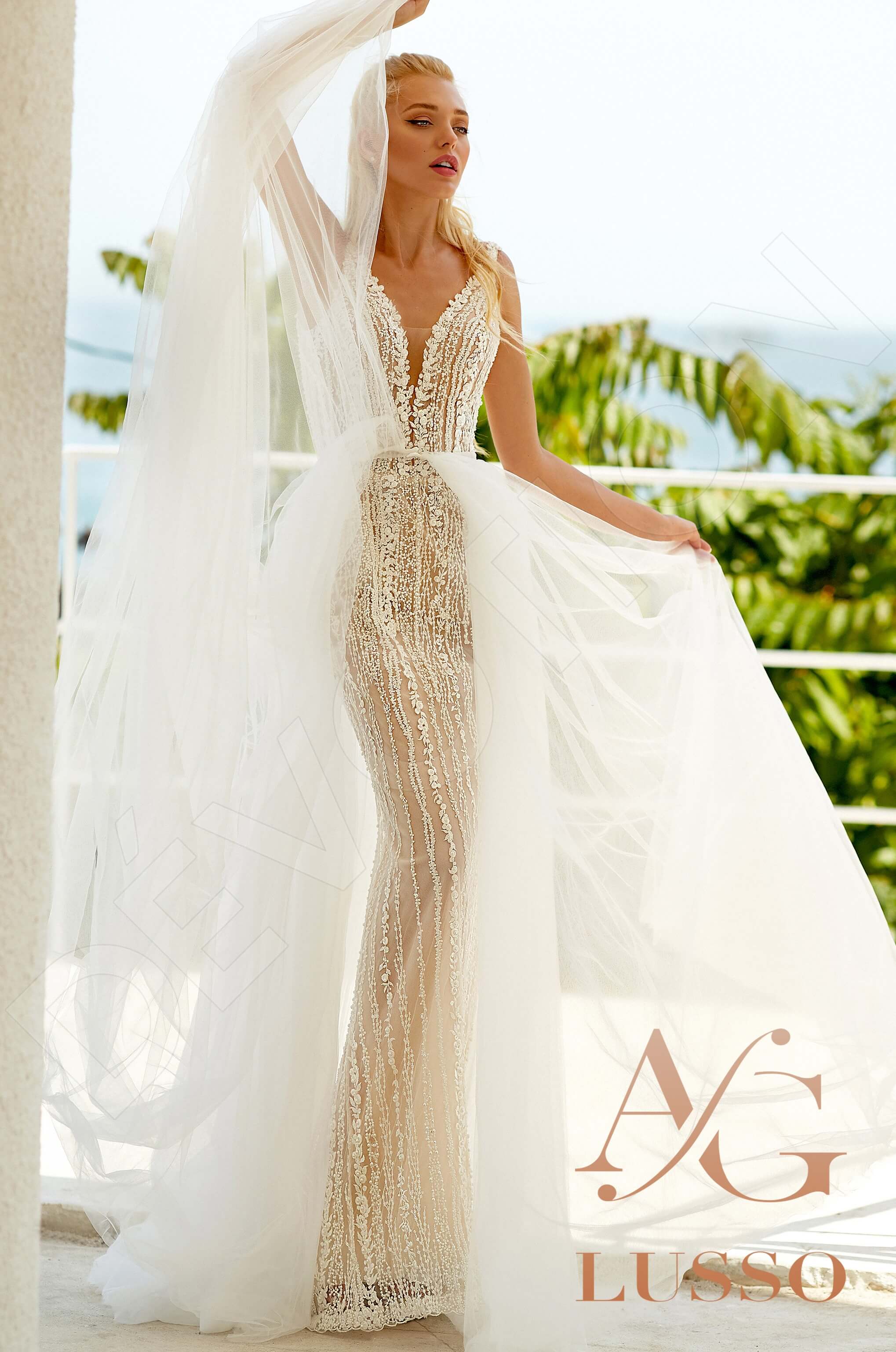 The Sheila A-line V-neck Milk Wedding dress, a graceful silhouette for the modern bride.