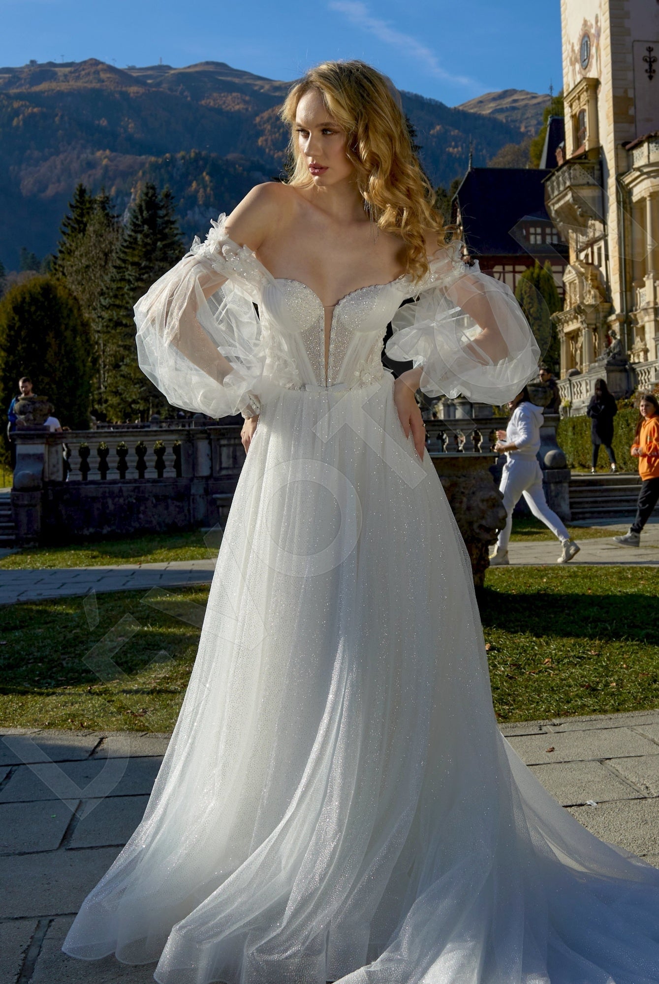 A bride in the Zhozefina A-line Off-shoulder Milk Wedding dress, showcasing elegant off-shoulder detailing and a flowing A-line skirt, perfect for a sophisticated reception.