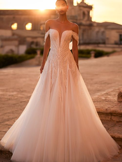 expensive wedding dresses Elevate Your Style with Luxury Bridal Designs-wedding The slim fit cascades into a graceful train Luxury Wedding Dresses | Premium